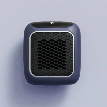 Compact mini wall mounted fan heater in gray on white wall for efficient, quiet heating in small spaces